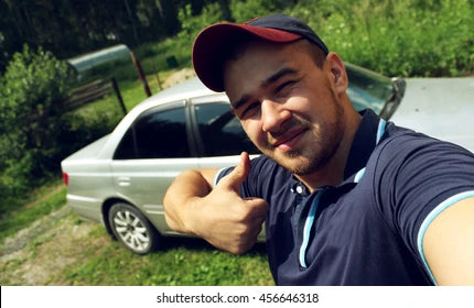 files/man-taking-selfie-on-car-260nw-456646318.webp